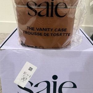 Brand new Saie vanity case with box